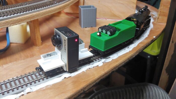 HO model railroad Camera-car on train, pointing backward